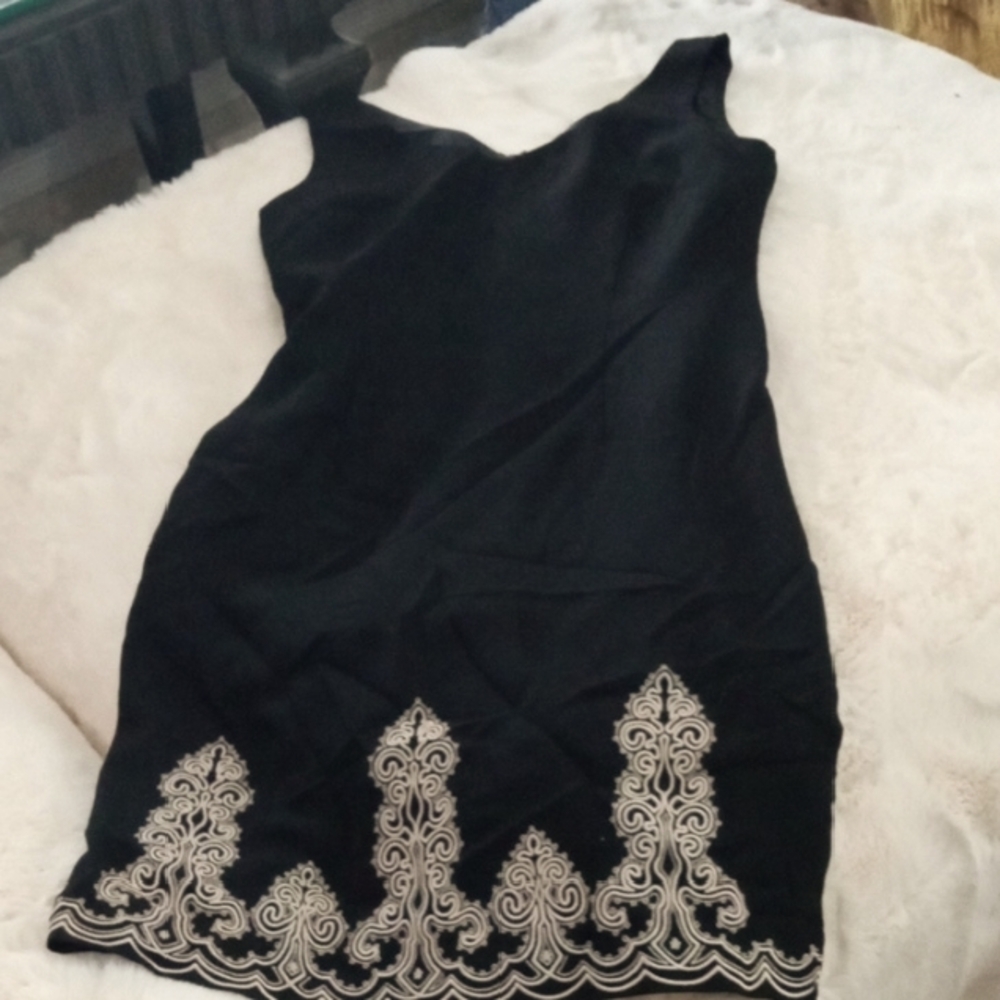 Dress With Nice Neckline Beautiful Embroidery At Hem